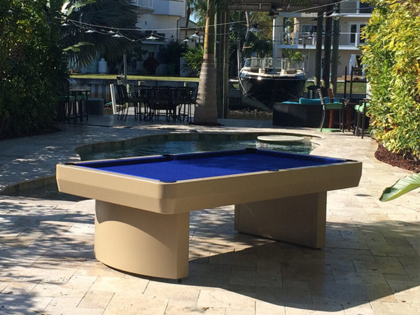 A pool table in the middle of an outdoor patio.