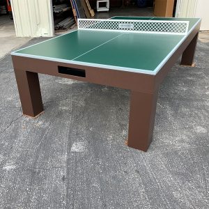 A table tennis table with a green top.